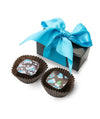 2-piece artisan chocolate box from Chocolat Celeste’s Winter Collection, featuring festive mitten and snowflake bonbons in black box with turquoise ribbon – part of Christmas in July Pre-Sale