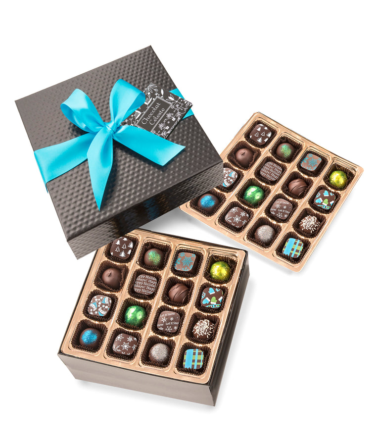 32-piece Winter Collection chocolate gift box from Chocolat Celeste, featuring two layers of festive artisan bonbons in a black quilted box with turquoise satin ribbon – part of Christmas in July Pre-Sale